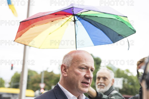 Kai Wegner (Governing Mayor of Berlin) gives interviews after raising the rainbow flag for Pride Week in front of the Rotes Rathaus in Berlin on 9 July 2025