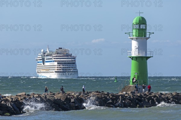 Cruise ship AIDAmar leaving, lighthouse, Warnow estuary, Baltic Sea, Warnemünde, Rostock, Mecklenburg-Western Pomerania, Germany