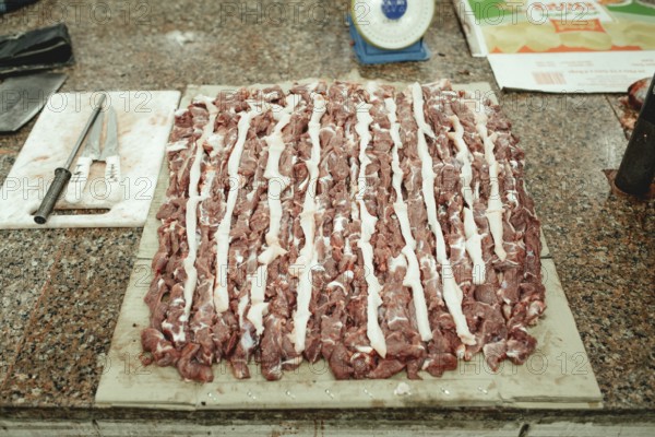 Market hall, section of camel butchers, Salalah, Dhofar, Oman