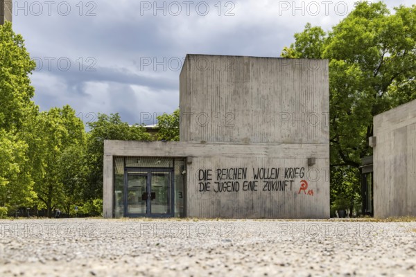 The rich want war. The youth want a future. Illegal protest at a building near the University of Stuttgart. Stuttgart, Baden-Württemberg, Germany