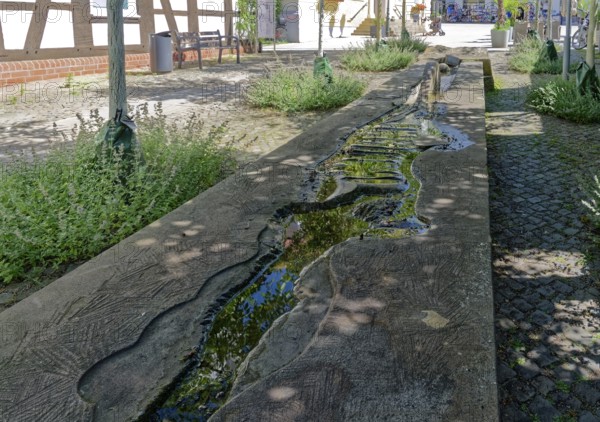 Artistic representation of the course of the Aller in the old town centre of Verden. Verden, Lower Saxony, Germany