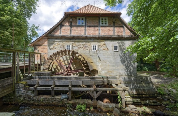 The Laderholz watermill, a technical monument, is located on the watercourse of the Alpe on the outskirts of Laderholz, a district of Neustadt am Rübenberge. The mill is driven by two water wheels. Laderholz, Neustadt am Rübenberge, Lower Saxony, Germany