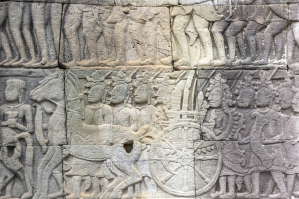Stone bas-reliefs, Khmer war campaign against the Cham, relief wall, east façade, Bayon temple, Angkor Thom, Siem Reap province, Cambodia