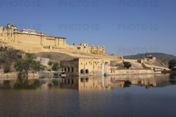 Amber Fort or fortress at Maota Lake on the Aravalli hill range, reflection in the water, Jaipur, Rajasthan, India