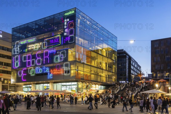 Stuttgart Art Museum in the evening with light installation and people on the steps. Long Night of the Museums in Stuttgart. Stuttgart, Baden-Württemberg, Germany