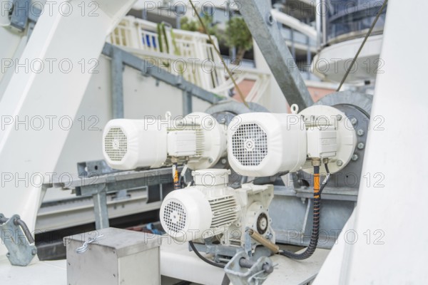 Close-up of technical machines and motors on a construction, Ferris wheel construction for the 950th anniversary of the town of Calw, Black Forest, Germany
