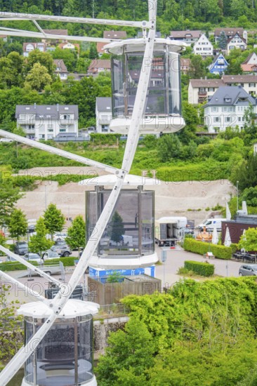 View from the Ferris wheel with a view of houses and wooded hills in the background, Ferris wheel construction for the 950th anniversary of the town of Calw, Black Forest, Germany