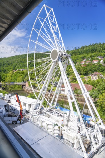 Incompletely constructed Ferris wheel, embedded in a green landscape with villages, Ferris wheel construction for the 950th anniversary of the town of Calw, Black Forest, Germany