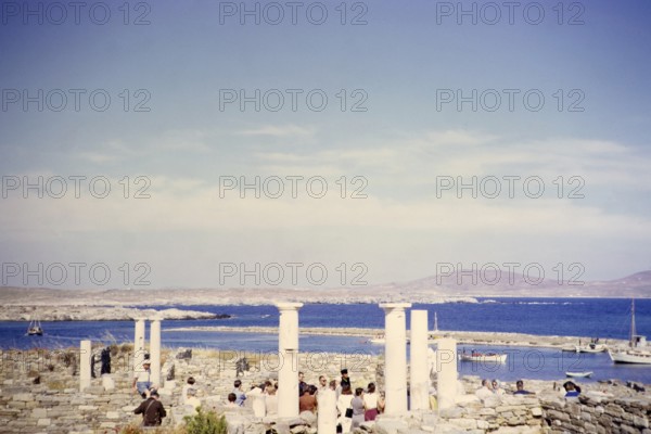 Tourists visiting the archaeological site, Delos, Cyclades archipelago, Greece, Europe 1967