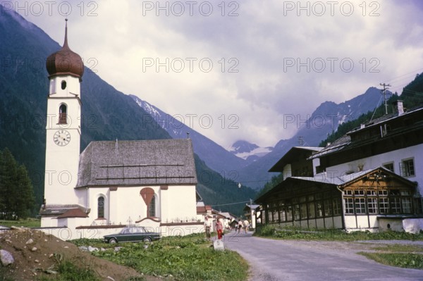 Historic village buildings and church of Maria Hilf, Gries im Sulztal, Ötztal Alps, Tyrol, Austria, Europe 1970