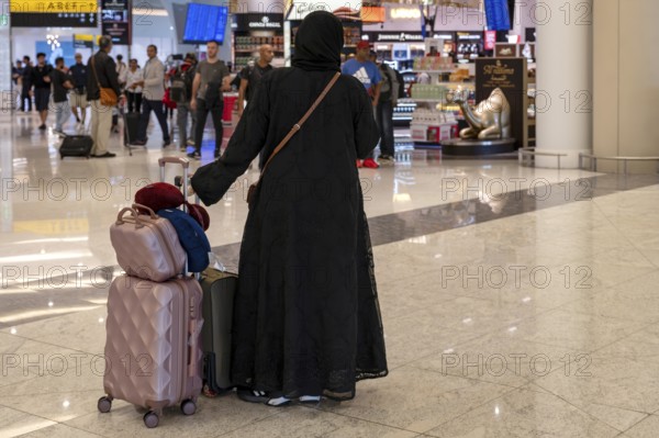 Arab woman with traditional garment and headdress