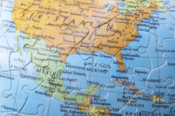 Puzzle globe. Map made from puzzle pieces. Gulf of Mexico