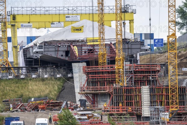 Rhine bridge Duisburg-Neuenkamp, motorway A40, start of construction of the second bridge, bridge piers and the first bridge segment are erected on the Neuenkamp side of the Rhine, North Rhine-Westphalia, Germany