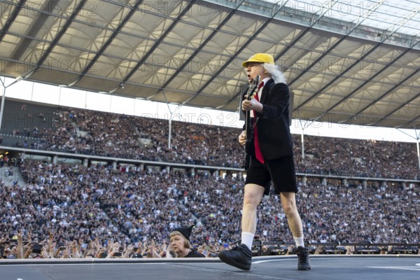 Angus Young, lead guitarist of AC/DC live on Power Up Tour 2025 at the Olympiastadion Berlin on 30 June 2025