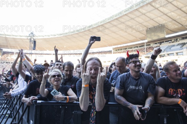 Fans in the front row in front of the concert of AC/DC live on Power Up Tour 2025 at the Olympiastadion Berlin on 30 June 2025