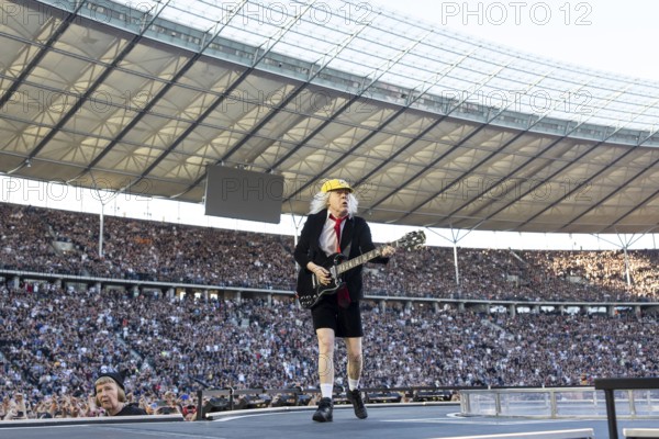 Angus Young, lead guitarist of AC/DC live on Power Up Tour 2025 at the Olympiastadion Berlin on 30 June 2025