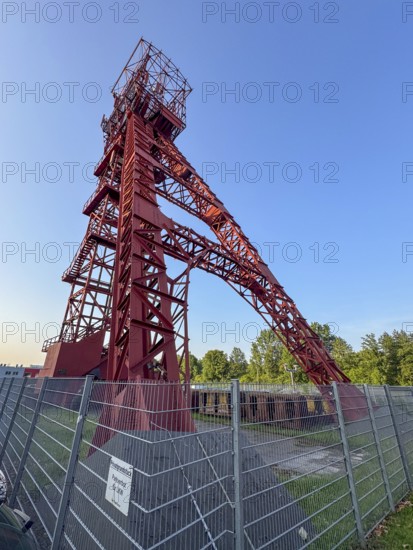 Historic red headframe historic red winding tower of Bonifacius colliery coal mine in today's Kray Nord district, Essen, North Rhine-Westphalia, Germany