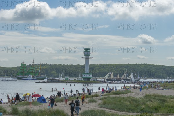 Windjammer Parade 2025 on the Kiel Fjord at the end of Kiel Week, tall ships, three-master Alexander von Humboldt, spectators, Falkensteiner Strandleben, lighthouse, summer weather, sunshine, forest, Kiel, Schleswig-Holstein, Germany