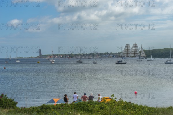 Windjammer parade 2025 on the Kiel Fjord at the end of Kiel Week, tall ships, three-master, sail training ship Gorch Fock, spectators, Laboe marina, naval memorial, summer weather, sunshine, forest, Kiel, Schleswig-Holstein, Germany
