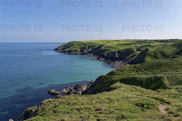 The South-West Coast Path in the south-west of England, a long-distance footpath near the southern tip of Cornwall on the English Channel. Cadgwith, Cornwall, South-West England, Great Britain