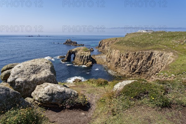 Rock formation and rock gate off the west coast of England in the Atlantic Ocean. Land's End, the tip of the headland in the west of Cornwall, is the most westerly point in England. Land's End, Sennen, Penzance, Cornwall, South West England, Great Britain