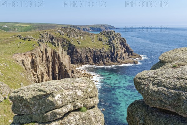 Rock formation off the west coast of England on the Atlantic Ocean. Land's End, the tip of the headland in the west of Cornwall, is the most westerly point in England. Land's End, Sennen, Penzance, Cornwall, South West England, Great Britain