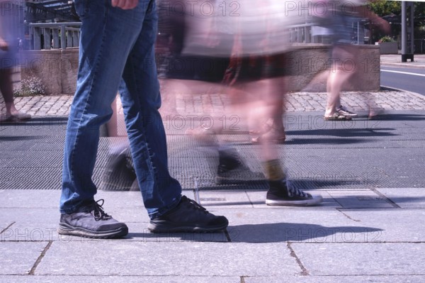 Passers-by in a summer city, shopping, Germany