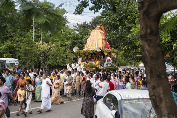 Hindu devotees takes part in Rath Yatra religious procession Guwahati, India on June 27, 2025. Rath Yatra, also known as the Chariot Festival, is a major Hindu festival celebrated in India
