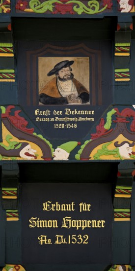 Hoppenerhaus, the most magnificent half-timbered house in the historic centre of Celle with a picture of Duke Ernst the Confessor, detail with painted wood carvings, Celle, Lower Saxony, Germany