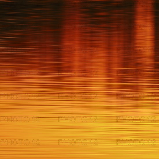 Colours of the sun... Sunset on the water (Lower Rhine, North Rhine-Westphalia), yellow red orange water reflection, reflection of the colours of the setting sun on a calm, only slightly moving water surface, local nature, Bislicher Insel, district Wesel, Rhineland, Lower Rhine, North Rhine-Westphalia, Germany, Western Europe