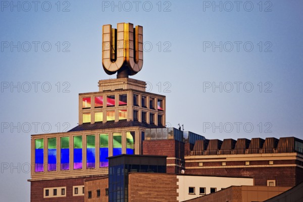 Dortmunder U, Flying pictures by Adolf Winkelmann at sunrise, Dortmund, Germany