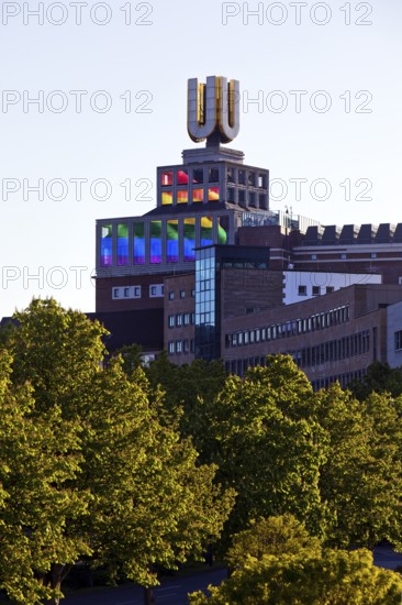 Dortmunder U, Flying pictures by Adolf Winkelmann with green trees, Dortmund, Germany