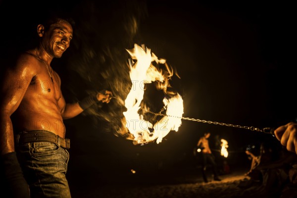 Fire show, jugglers with fire, Ao Nang Beach, sunset, Ao Nang, Krabi, Thailand