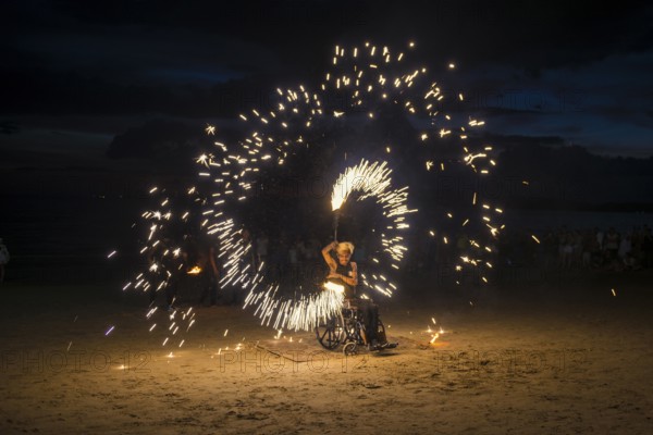 Fire show, jugglers with fire, wheelchair users, Ao Nang Beach, sunset, Ao Nang, Krabi, Thailand