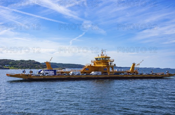 The car ferry SATURNUS, which operates as a floating road between the archipelago, navigates off the coast near Lysekil, Bohuslän, Västra Götalands län, Sweden, Scandinavia