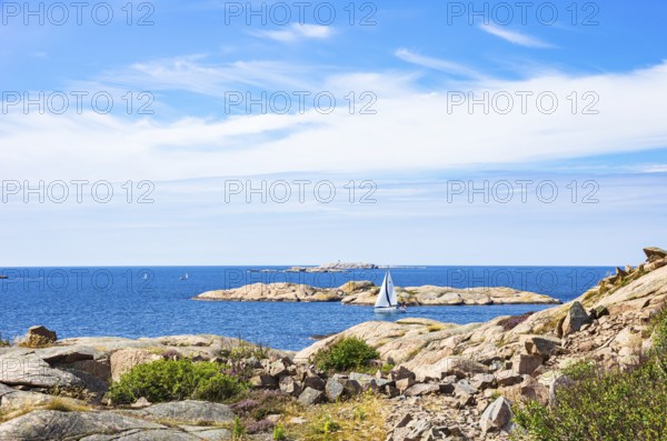 Archipelago with sailing boats off the coast of Lysekil, Bohuslän, Västra Götalands län, Sweden, Scandinavia
