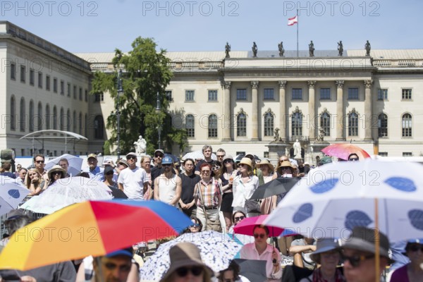 Visitors at the Staatsoper für alle, a free open-air concert with conductor Christian Thielemann and the Staatskapelle Berlin on Berlin's Bebelplatz, Berlin, 22 June 2025