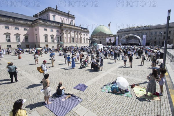 Due to high temperatures, only a few visitors are left after the concert break on Bebelplatz at the Staatsoper für alle, a free open-air concert with conductor Christian Thielemann and the Staatskapelle Berlin on Berlin's Bebelplatz, Berlin, 22 June 2025