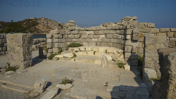 Historic site with preserved stone walls, under a clear sky, Agios Stefanos Beach, Agios Stefanos Basilica, Agios Nikolaos Chapel, Kastri Island, Kos, Dodecanese, Greek Islands, Greece