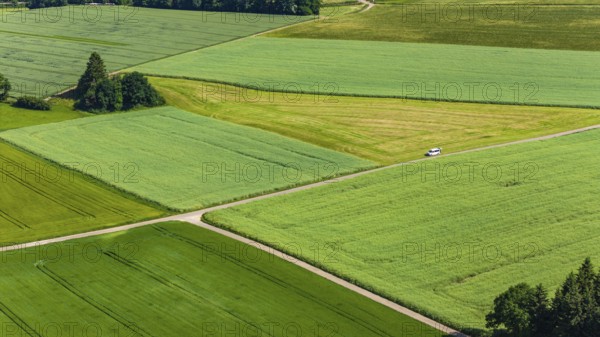 Landscape in the Swabian Alb with green fields. Drone shot. Amstetten, Baden-Württemberg, Germany