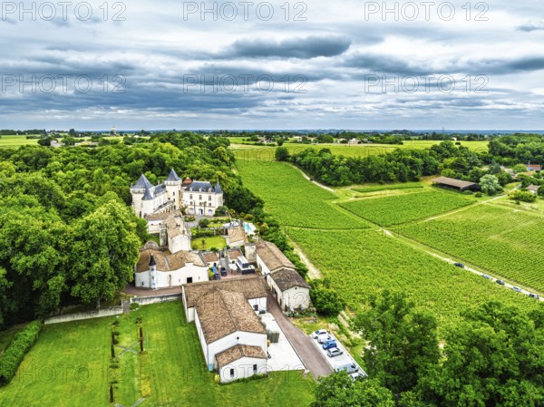 Castle of La Riviere, Vineyard Chateau de La Riviere from a drone, Bordeaux, France