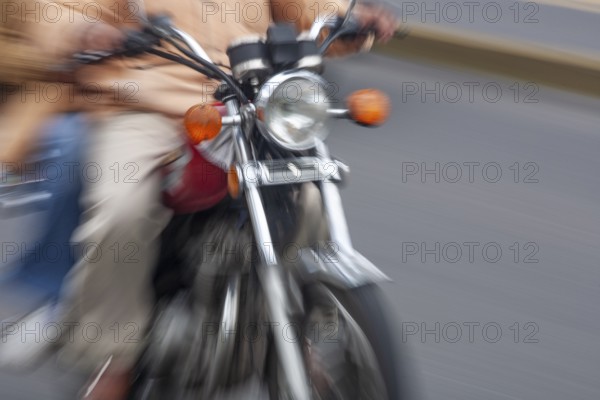 Man riding a motorcycle, Riding at high speed, Photo with motion blur, City of Quito, Pichincha province, Ecuador, South America