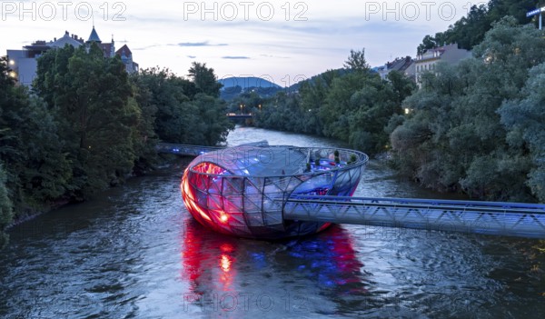 Murinsel floating island on the river Mur by night, Graz, Austria