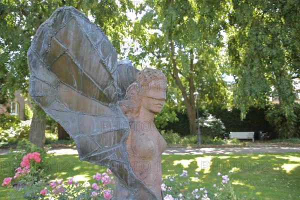 Sculpture Female Winged Figure by Volker Krebs 1986, modern art, female figure with wings, angel, garden with roses, rose garden, Ettlingen, Black Forest, Northern Black Forest, Baden-Württemberg, Germany