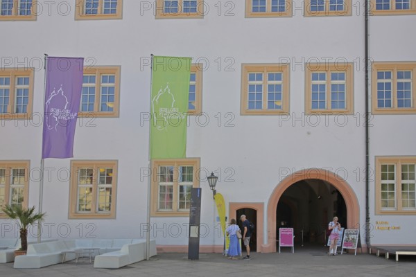 Entrance with flags and inscription Schlossfestspiele zum barocken Schloss, Museum, Festspiele, Ettlingen, Black Forest, Northern Black Forest, Baden-Württemberg, Germany