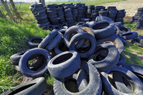 Old tyres in the landscape, car tyres