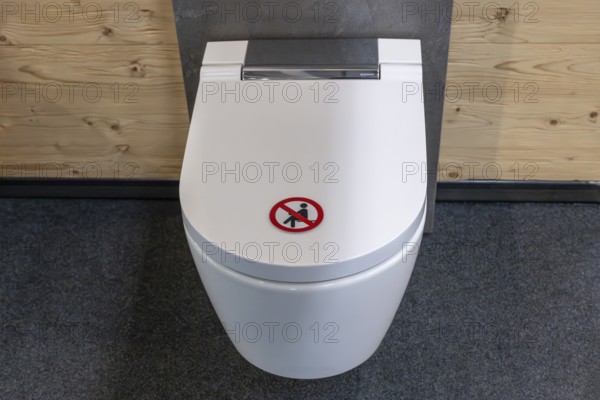 Symbol photo toilet seating ban