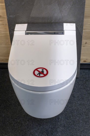 Symbol photo toilet seating ban