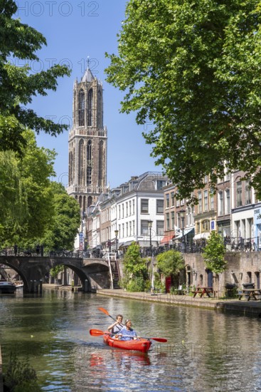 The old town centre of Utrecht, Oudegracht, around 2 km long with many old houses, cathedral tower, highest church tower in the Netherlands, newly renovated, shops, restaurants directly on the canal, many bridges, boat traffic of all kinds, canal tour, Netherlands