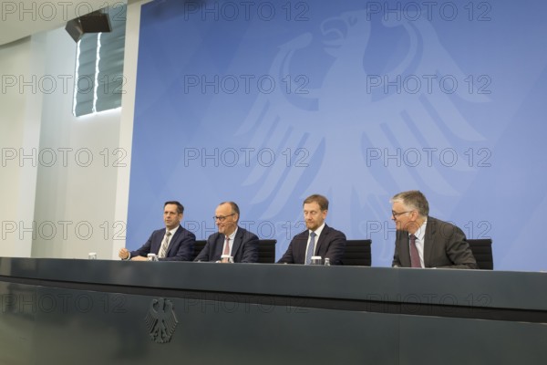 Olaf Lies (SPD, Minister President of Lower Saxony), Friedrich Merz (CDU, Federal Chancellor), Michael Kretschmer (CDU, Minister President of the Free State of Saxony) and Stefan Kornelius (Spokesperson of the German Federal Government and Head of the Press and Information Office) during a press conference after the consultation between Federal Chancellor Friedrich Merz and the heads of government of the federal states in the Federal Chancellery, Berlin, 18 June 2025